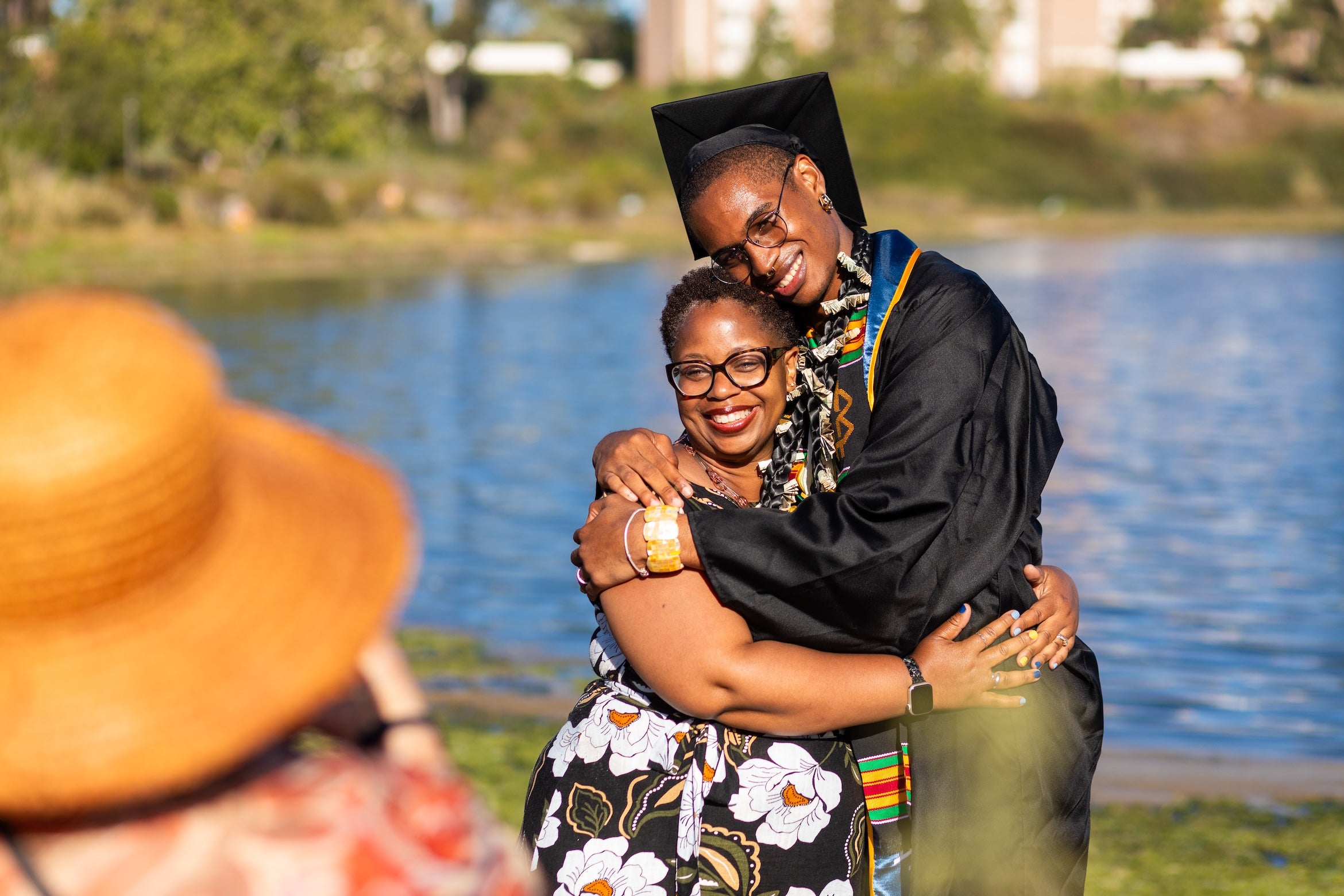 graduating student hugging their parent